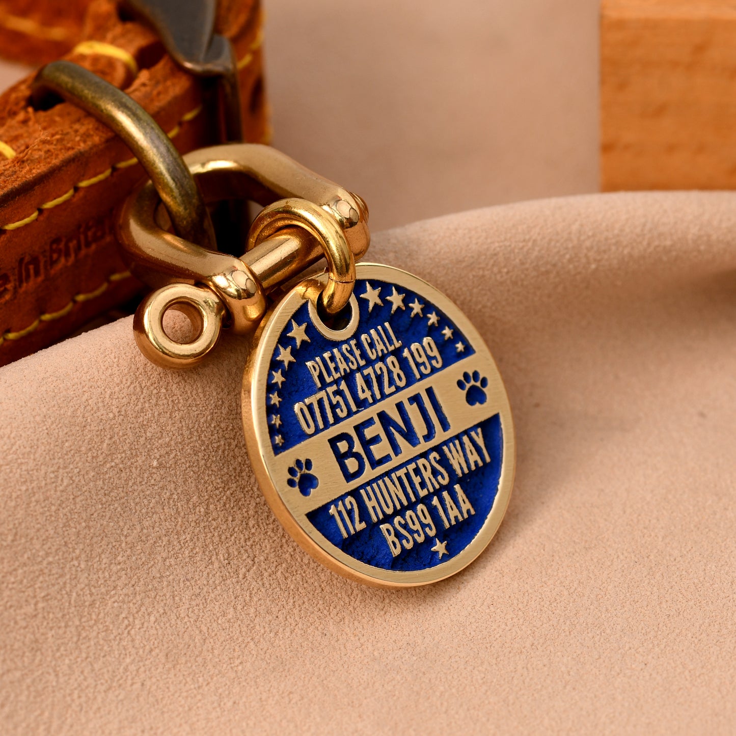 The Pawprint Tag — Brass Dog Tag with Paw & Leaf Engraving