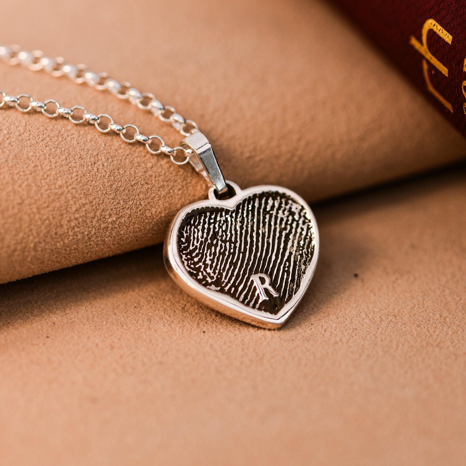 Sterling silver artisan fingerprint heart necklace with a full fingerprint filling the heart