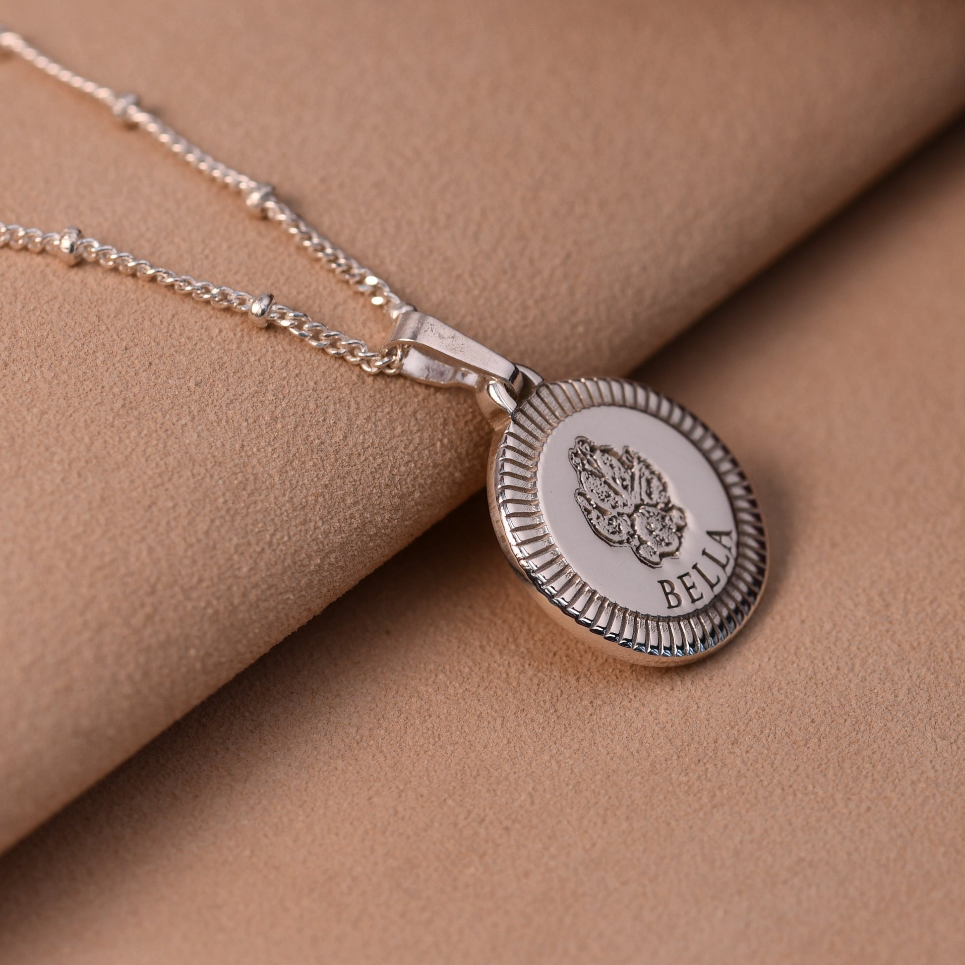 Heavyweight sterling silver sunburst round pendant with actual pet paw print and name Bella engraved, handmade UK