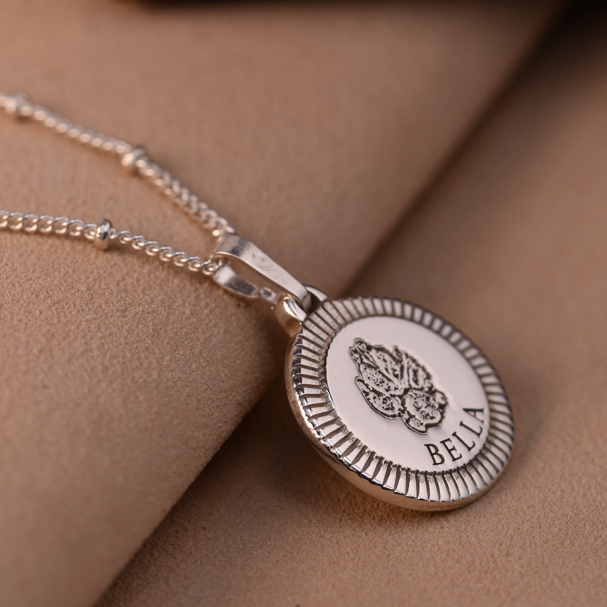 Heavyweight sterling silver sunburst round pendant with actual pet paw print and name Bella engraved, handmade UK