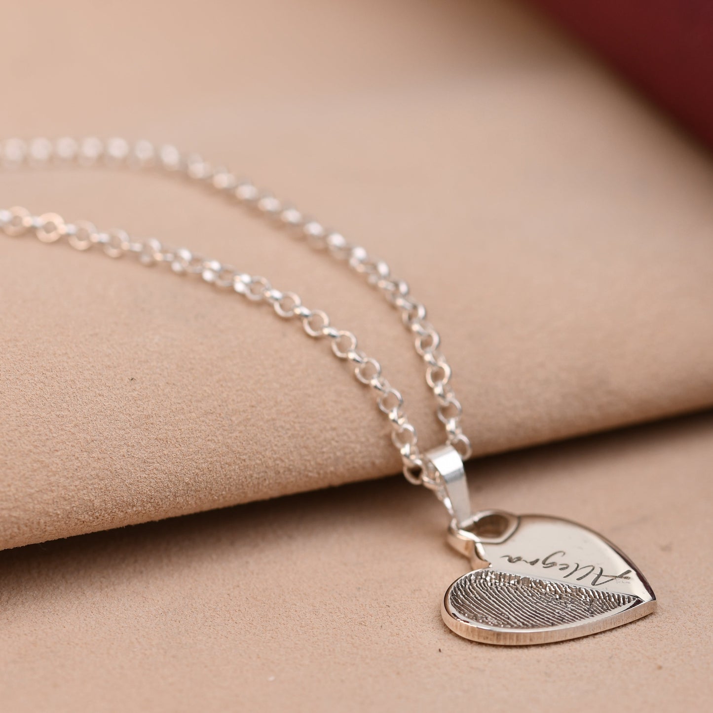 Fingerprint heart necklace with a full fingerprint engraved edge to edge