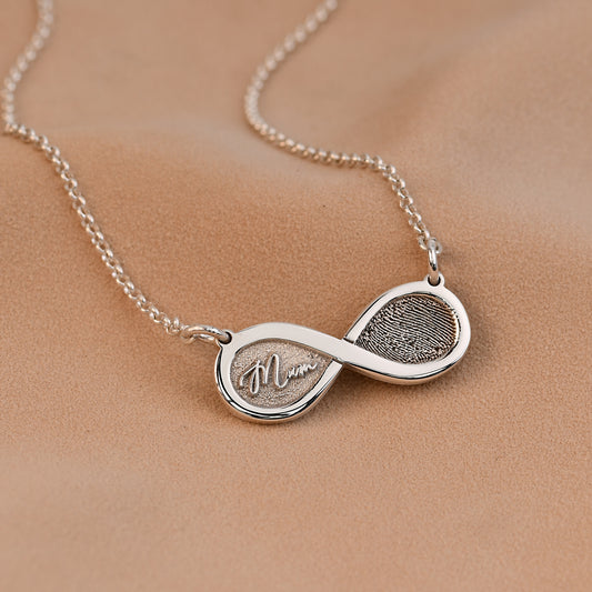 Sterling silver infinity fingerprint necklace with engraved Mum in handwriting style, handmade in Essex