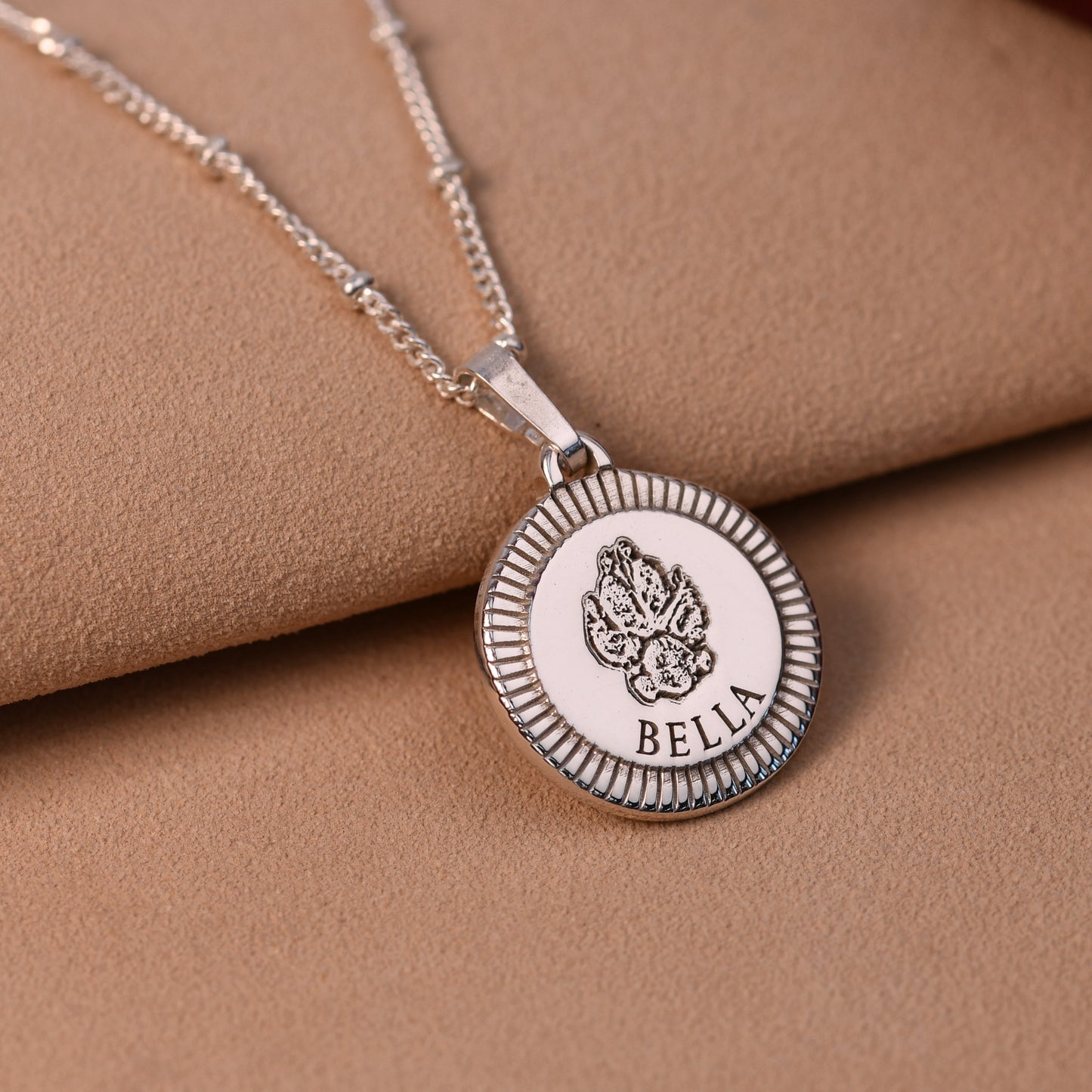 Heavyweight sterling silver sunburst round pendant with actual pet paw print and name Bella engraved, handmade UK