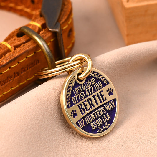 Brass dog tag with leaf and paw print engraving, full personalisation, name Bertie in purple
