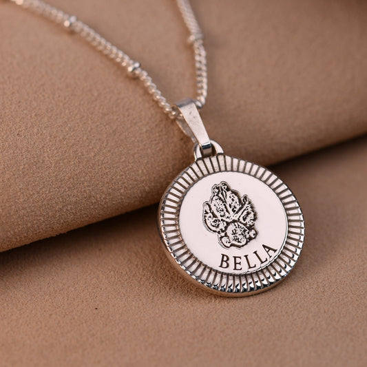 Heavyweight sterling silver sunburst round pendant with actual pet paw print and name Bella engraved, handmade UK