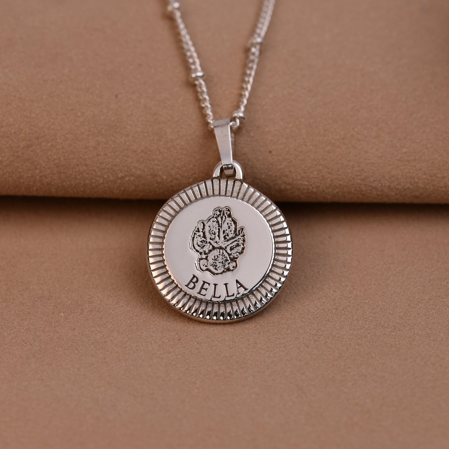 Heavyweight sterling silver sunburst round pendant with actual pet paw print and name Bella engraved, handmade UK