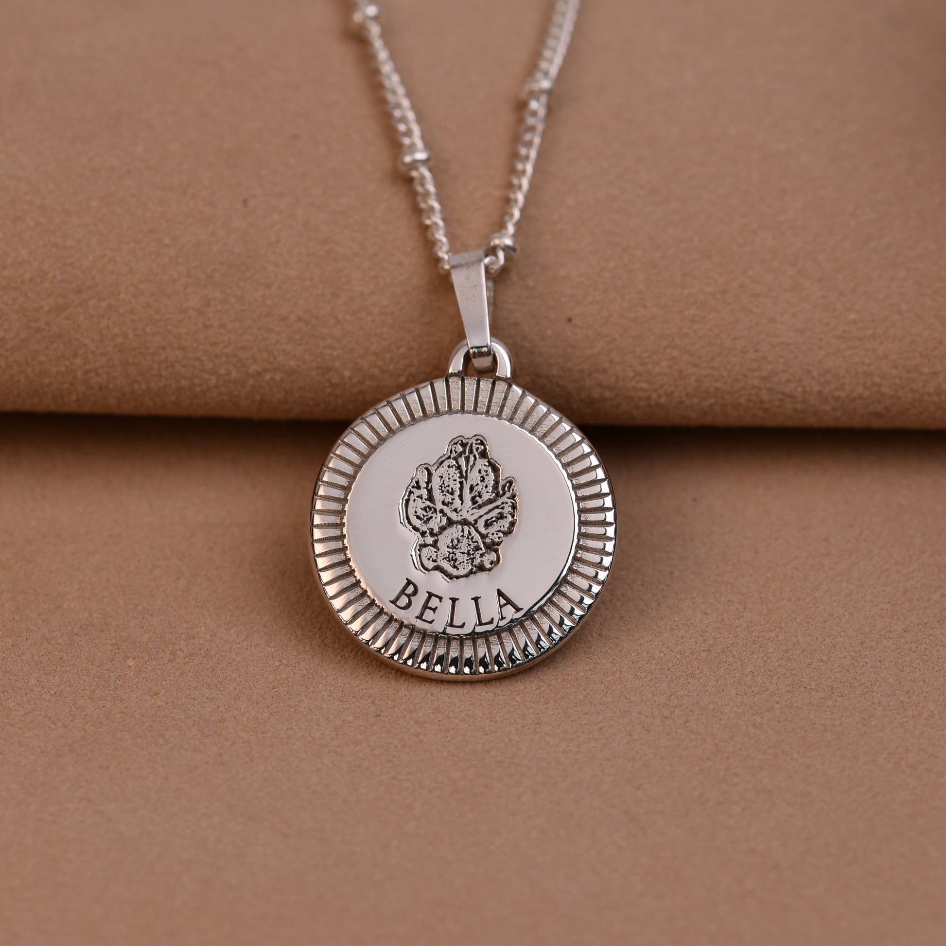 Heavyweight sterling silver sunburst round pendant with actual pet paw print and name Bella engraved, handmade UK